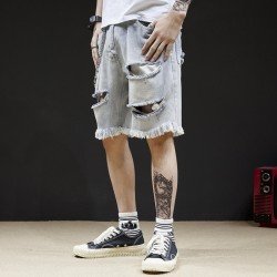 Shredded denim shorts